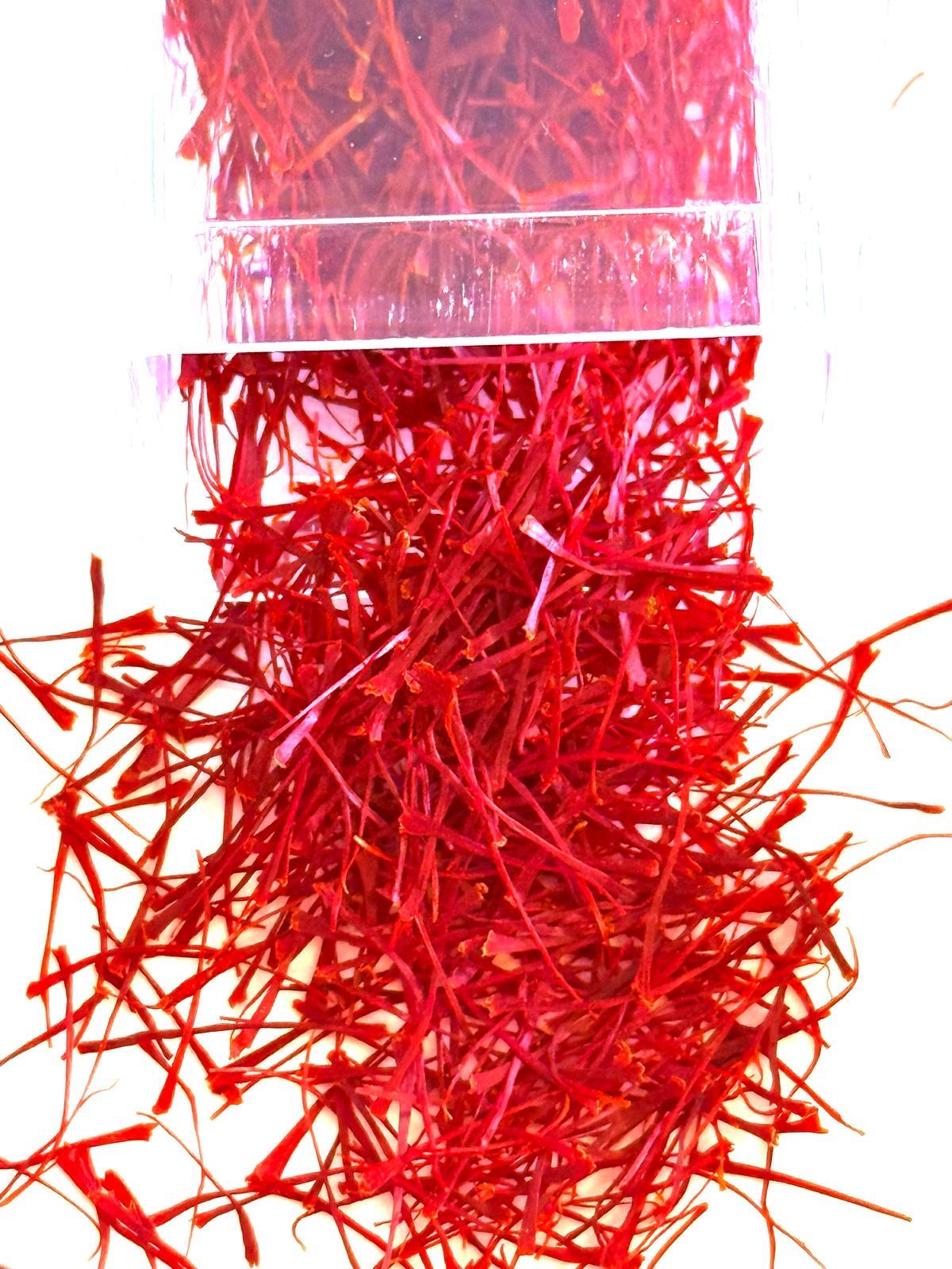 Pure deep red Afghan saffron threads on surface 